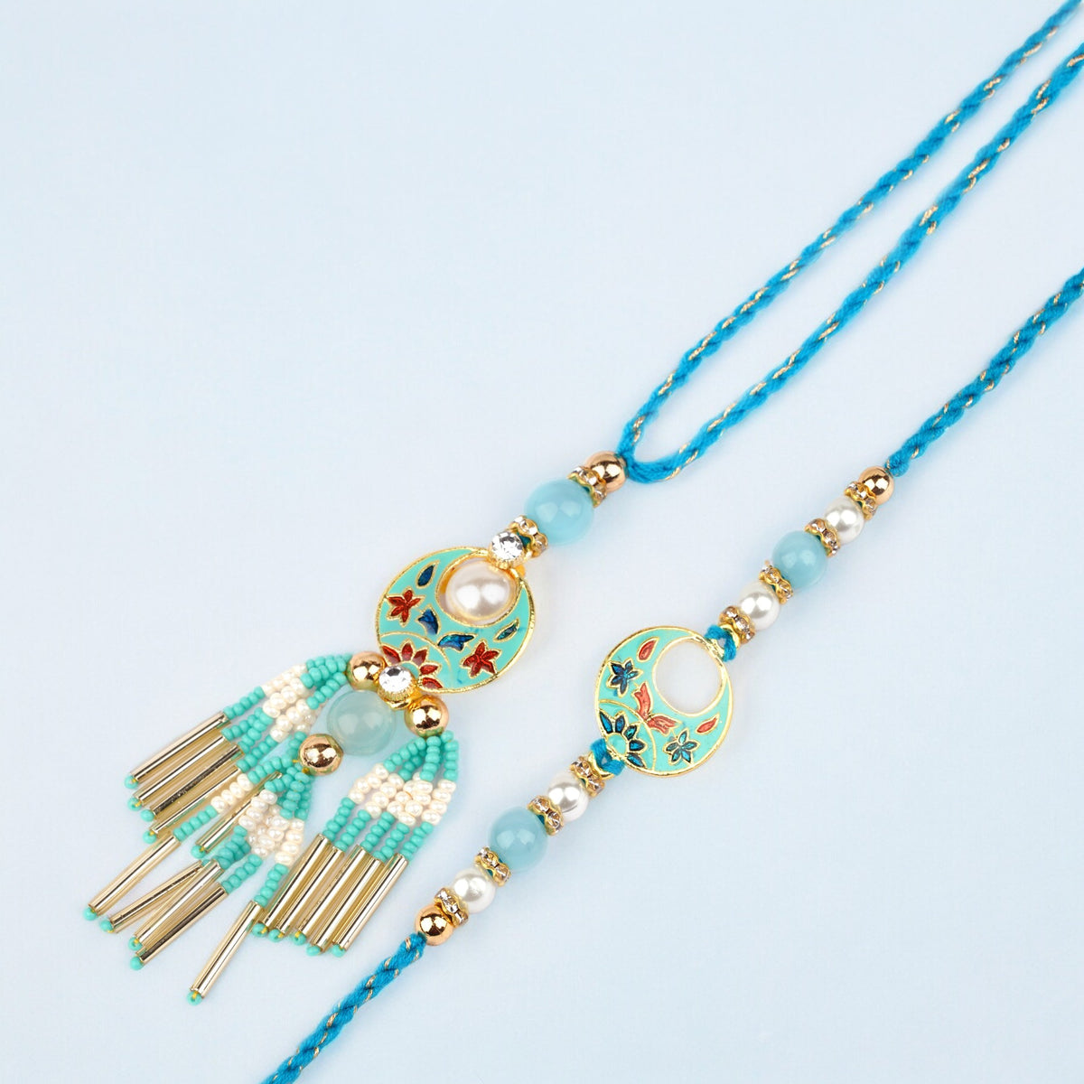 Rakhis Online- RM-211 Bhaiya Bhabhi rakhi with 100 gms of Dryfruits Mix Can 200 gms of Kaju katli