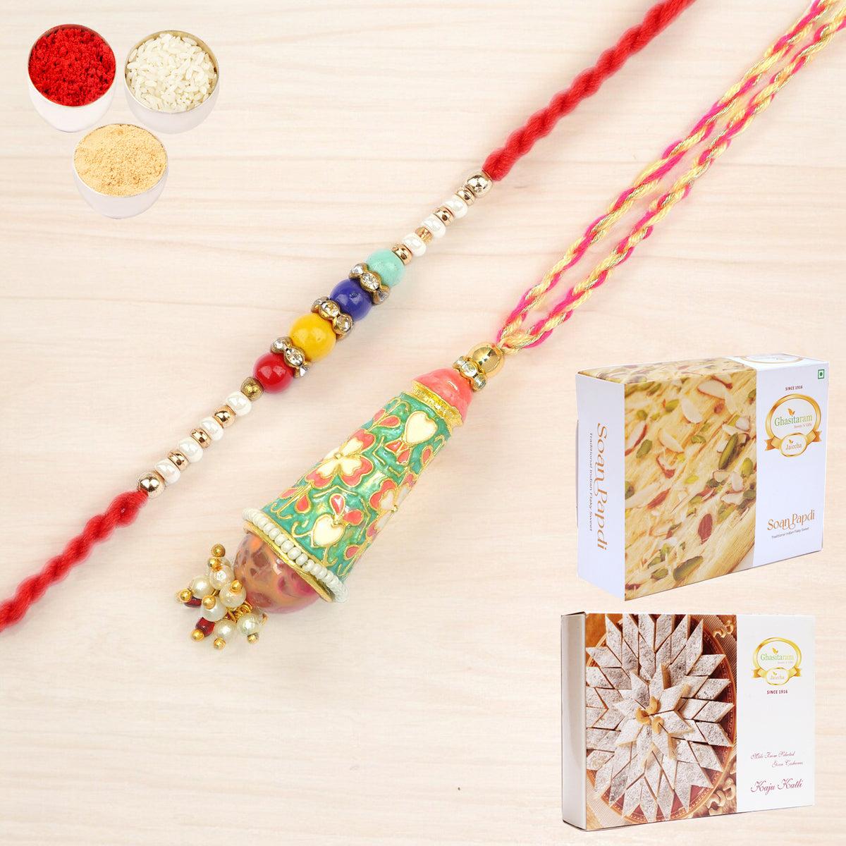  RM-213 Bhaiya Bhabhi rakhi with 200 gms of Kaju katli and 200 gms of Soan Papdi
