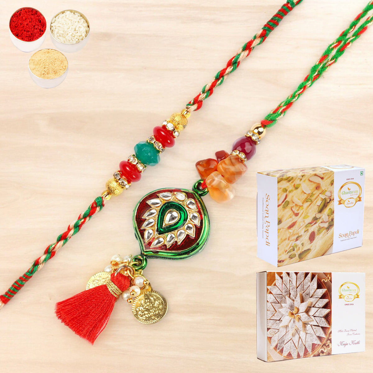 Rakhis Online- RM-217 Bhaiya Bhabhi rakhi with 200 gms of Kaju katli and 200 gms of Soan Papdi