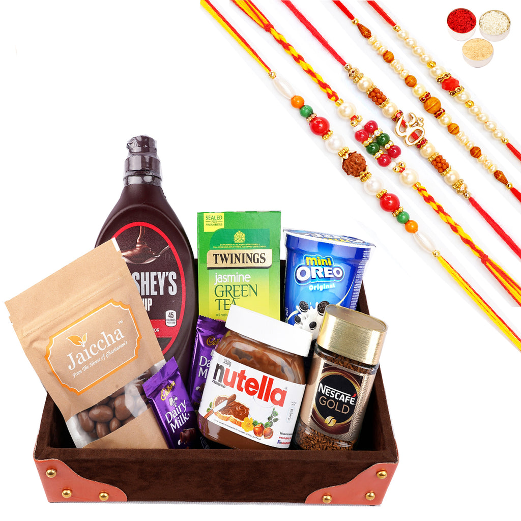 Rakhi Gifts-Korno Tray Of 8 Goodies with 5 Rakhis