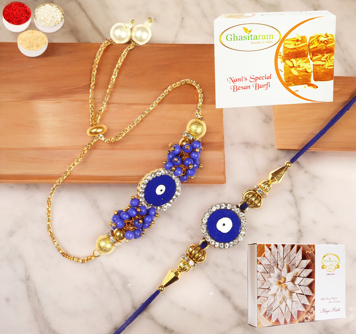 Rakhis Online-KB-7 Bhaiya Bhabhi Rakhi with 200 gms of Besan Barfi and 200 gms of Kaju Katli
