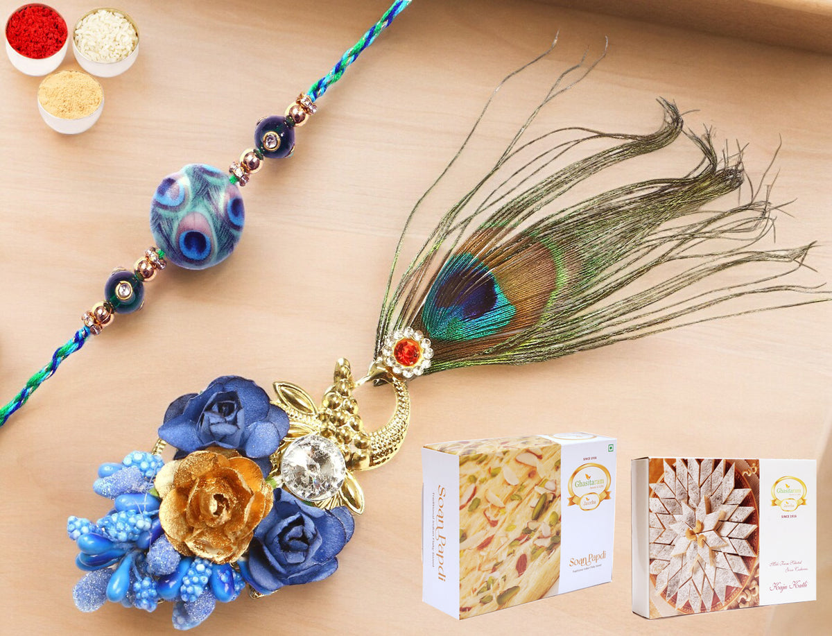 Rakhis Online-M-102 Bhaiya Bhabhi Rakhi with 200 gms of Kaju katli and 200 gms of Soan Papdi
