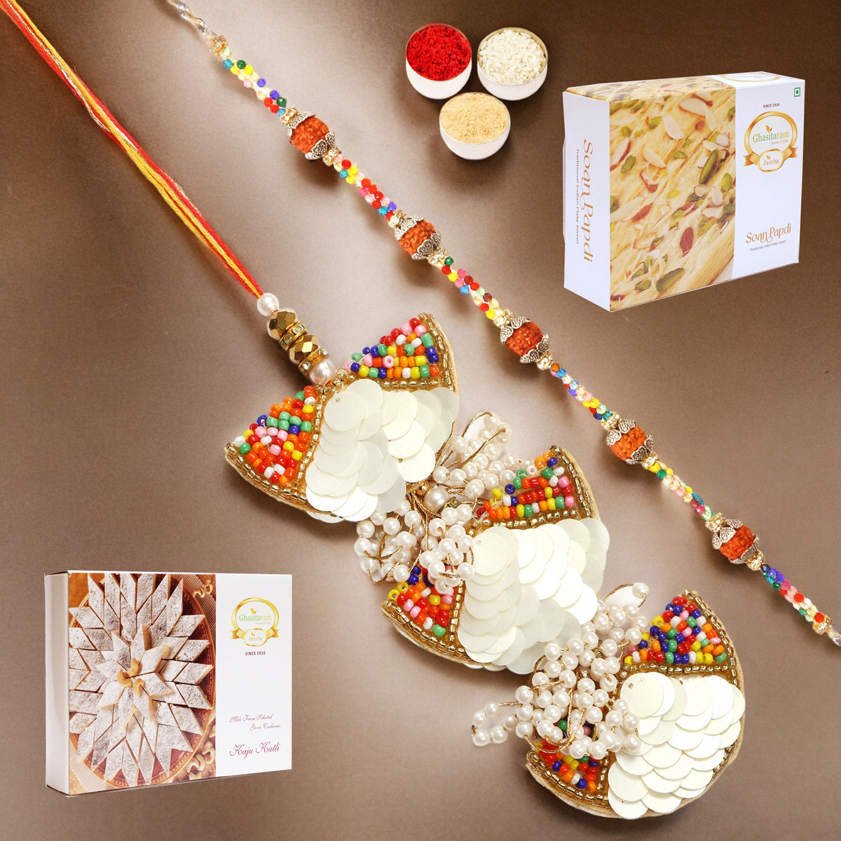 RM-122 Bhaiya Bhabhi Rakhi with 200 gms of Kaju katli and 200 gms of Soan Papdi