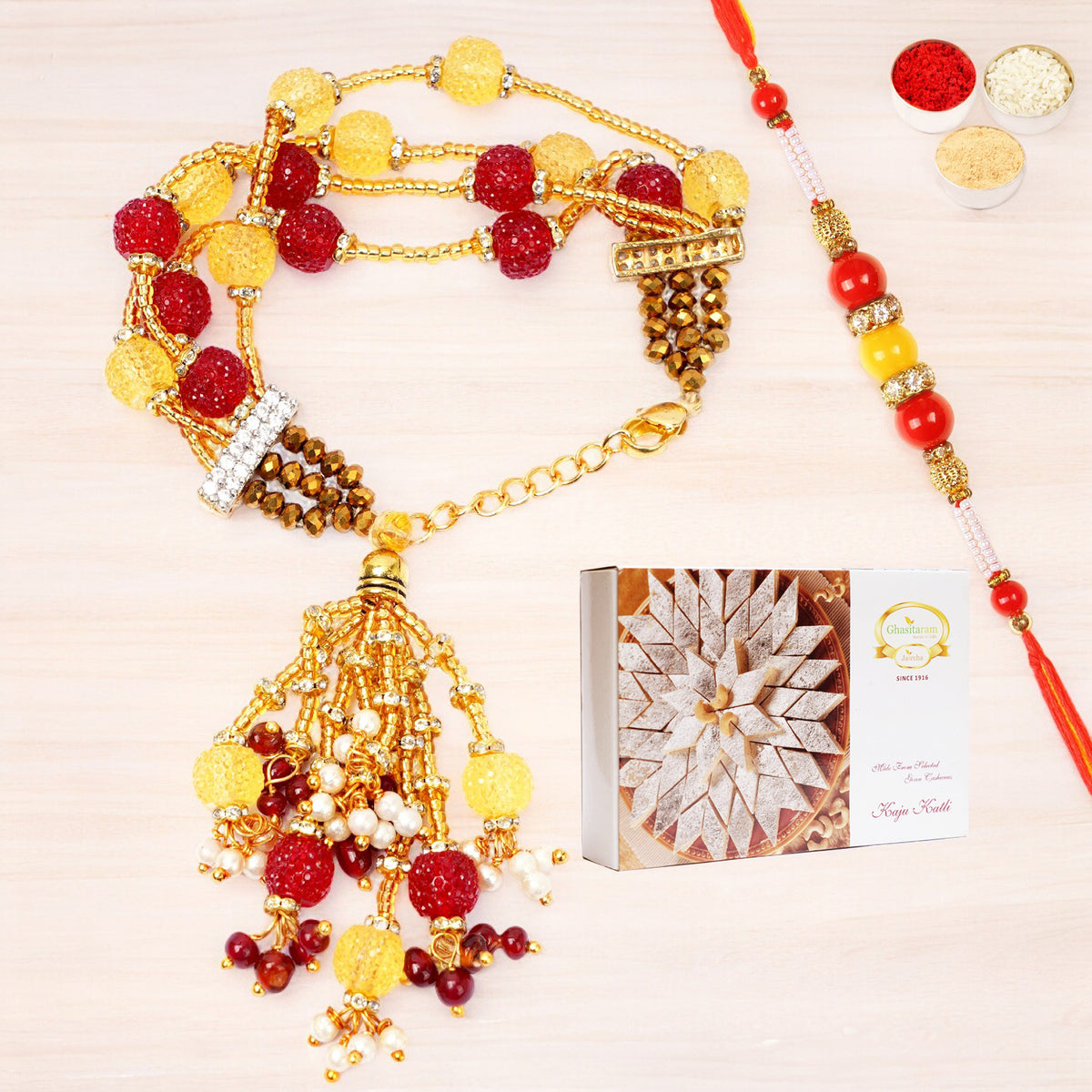 Rakhis Online USA-RM-205 Bhaiya Bhabhi Rakhi with 200 gms of Kaju katli