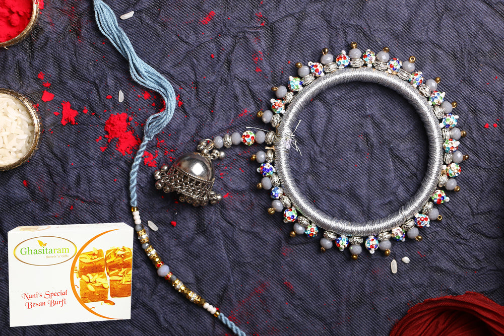 Rakhis Online-RM-262 Bhaiya Bhabhi Rakhi with 400 gms of Besan Barfi