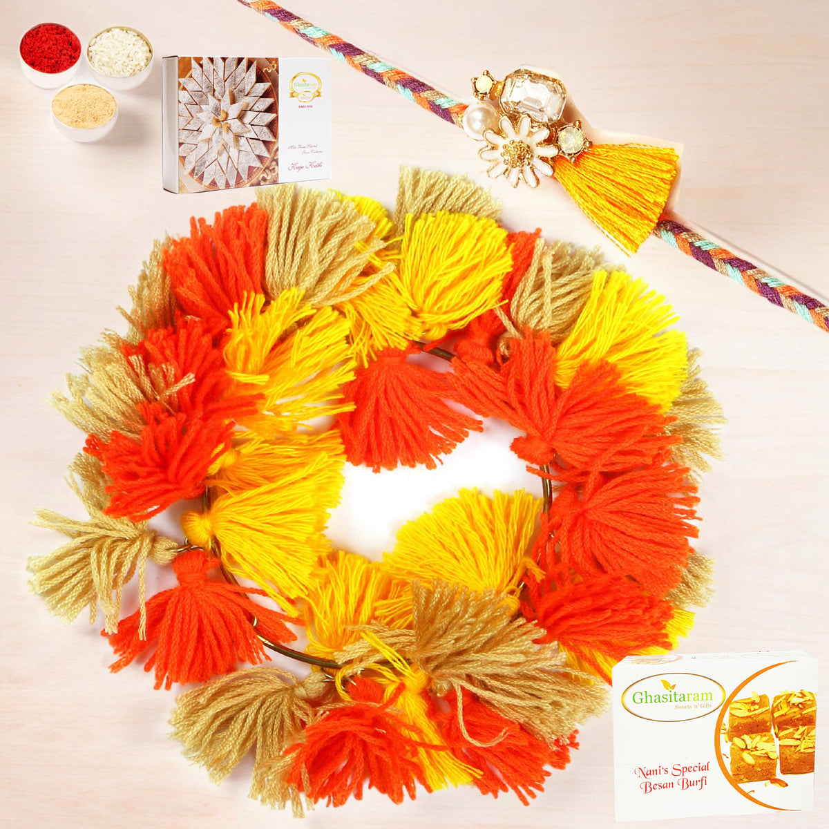 Rakhis Online-RM-268 Bhaiya Bhabhi Rakhi with 200 gms of Besan Barfi and 200 gms of Kaju Katli