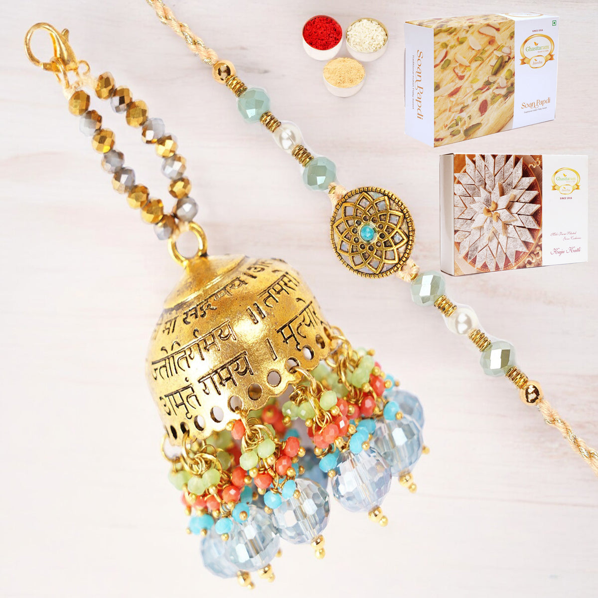 Rakhis Online-RM-270 Bhaiya Bhabhi Rakhi with 200 gms of Kaju katli and 200 gms of Soan Papdi