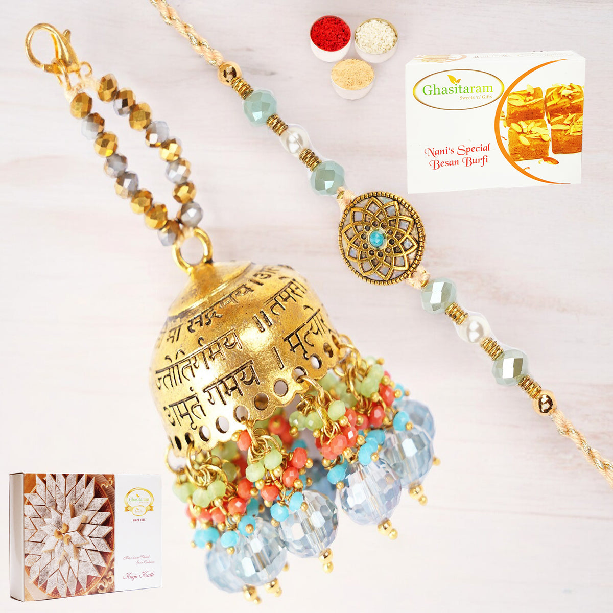 Rakhis Online-RM-270 Bhaiya Bhabhi Rakhi with 200 gms of Besan Barfi and 200 gms of Kaju Katli