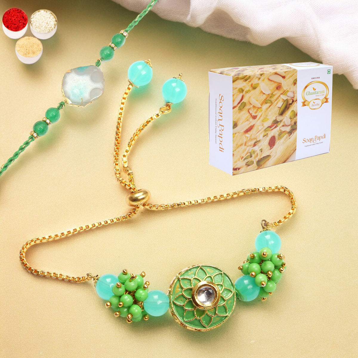 Rakhis Online Australia- T-12 Green Stone Bhaiya Bhabhi Rakhi with 200 gms Soan Papdi