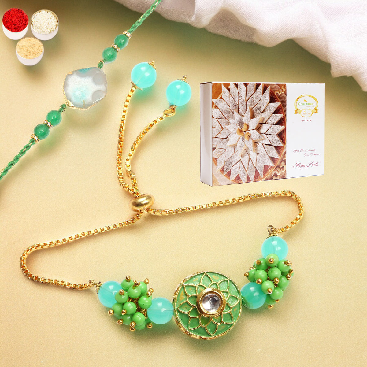 Rakhis Online UK- T-12 Green Stone Bhaiya Bhabhi Rakhi with 200 gms of Kaju katli
