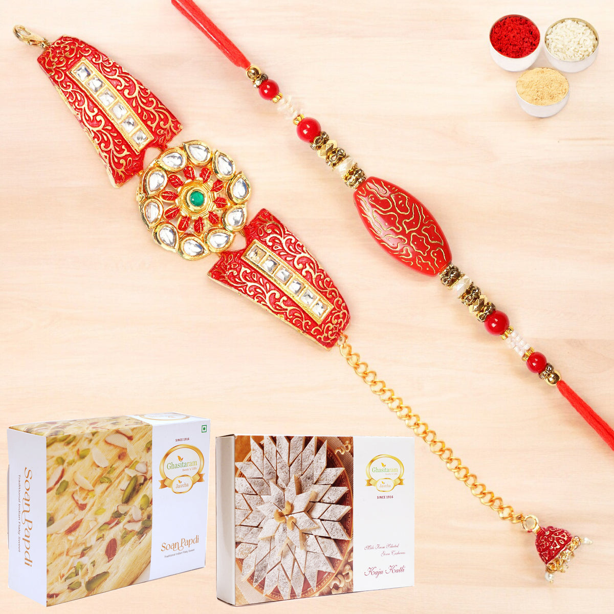 T-1 Red Bracelet Bhaiya Bhabhi Rakhi with 200 gms of Kaju katli and 200 gms of Soan Papdi
