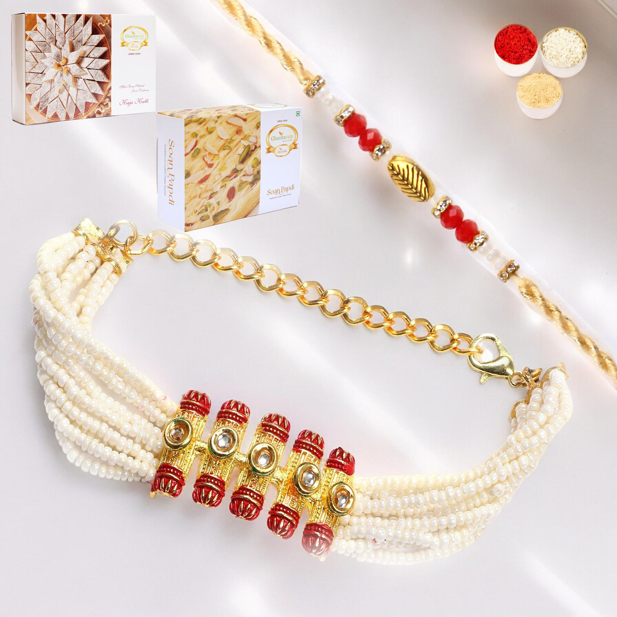T-24 Bhaiya Bhabhi Rakhi with 200 gms of Kaju katli and 200 gms of Soan Papdi