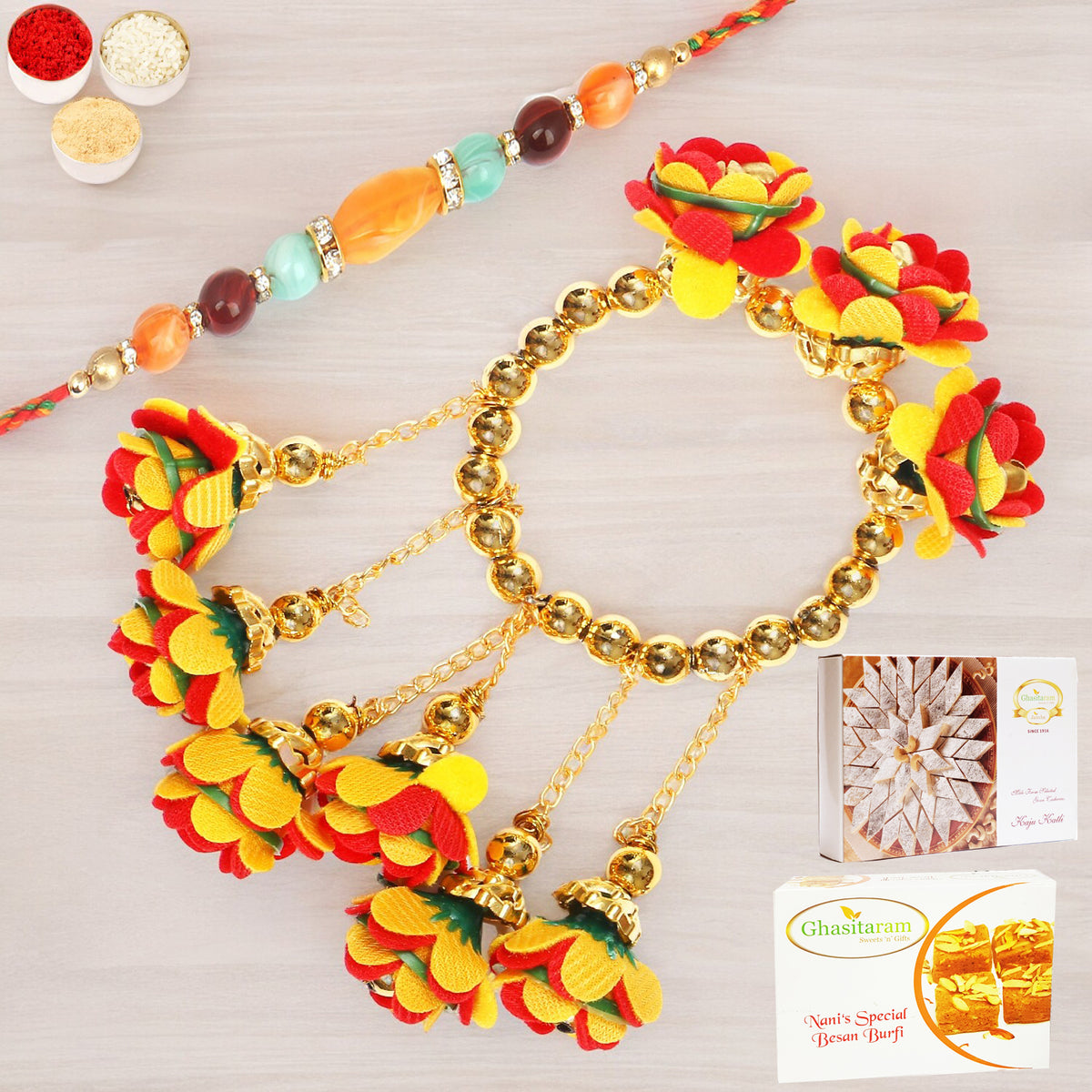 Rakhis Online-TK-27 Bhaiya Bhabhi Rakhi with 200 gms of Besan Barfi and 200 gms of Kaju Katli