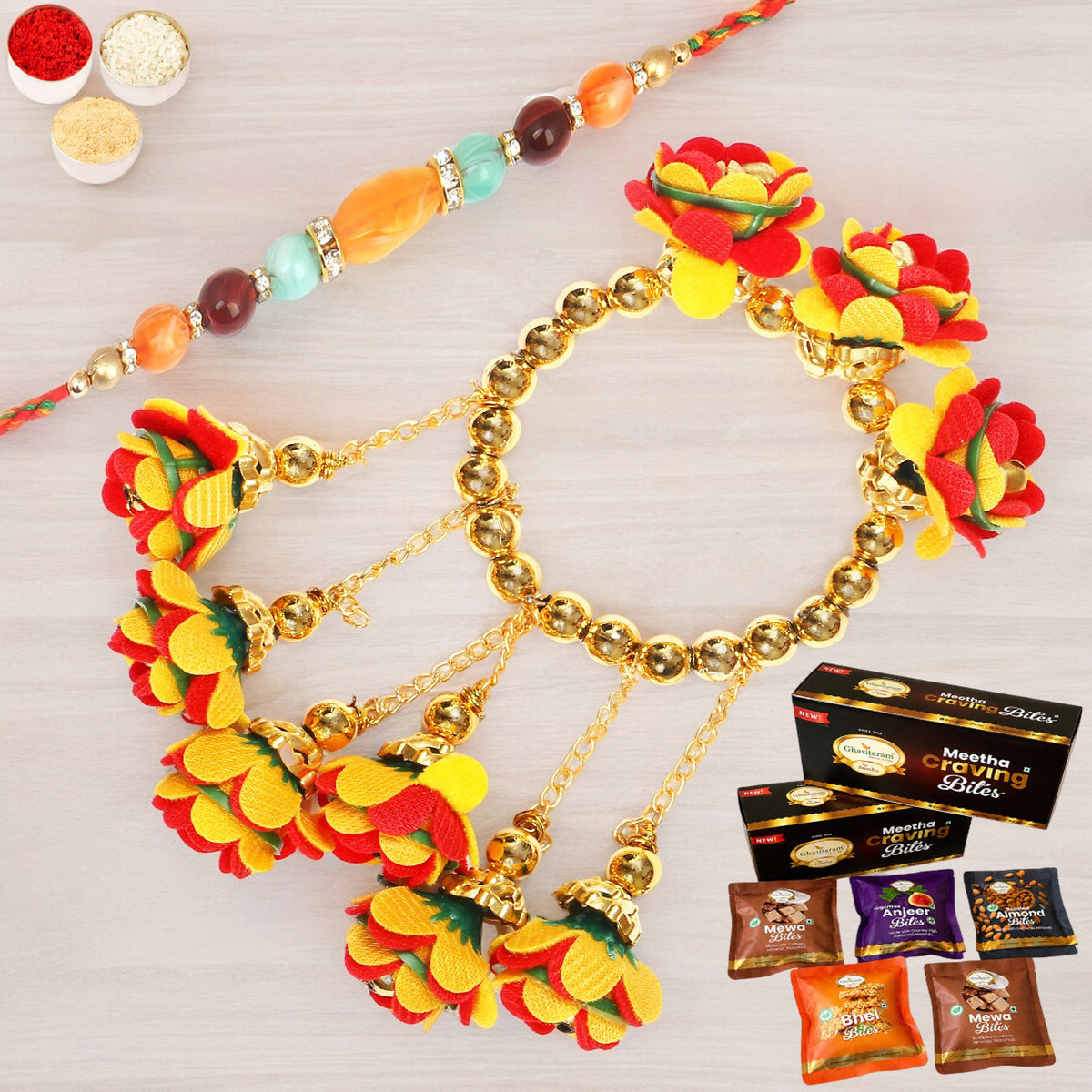 TK-27 Bhaiya Bhabhi Rakhi with Asorted bites box