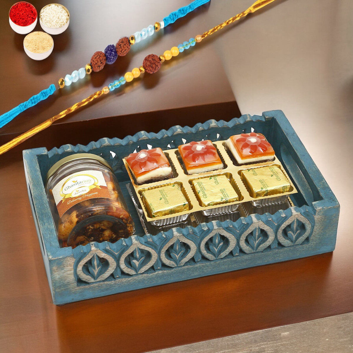 Rakhi Gifts-Blue wooden Tray with assorted Bites and Mix Dryfruits Jar With 2 blue rudraksh rakhis