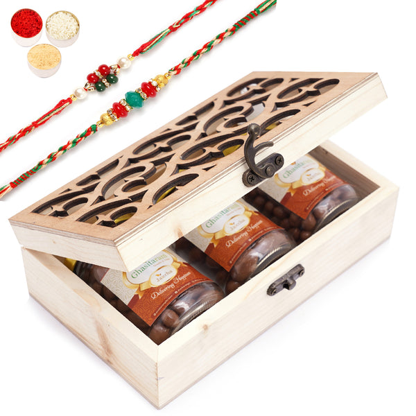 Natural Wood Carving Box With Chocolate Coated Almond, Chocolate Coated Butterscotch and Chocolate Coated Rasins With 2 Rakhis