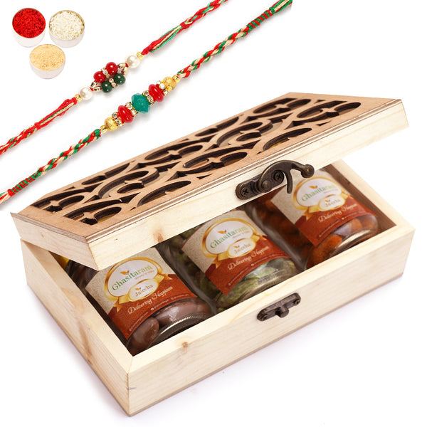 Natural Wood Carving Box With Chocolate Coated Almond, Crunchy Cashews and Paan Raisins With 2 Rakhis