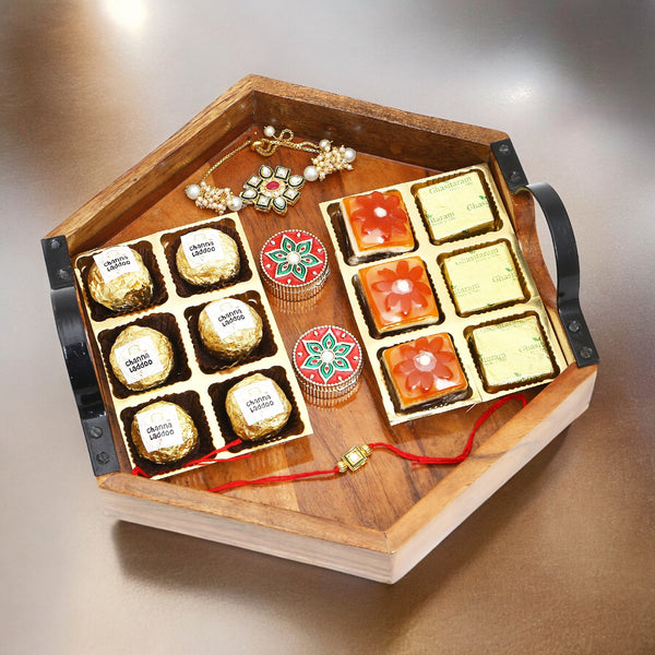 Rakhi Gifts-Hexagon Tray of assorted Bites, Roli Chawal Container and Bhaiya Bhabhi Rakhis