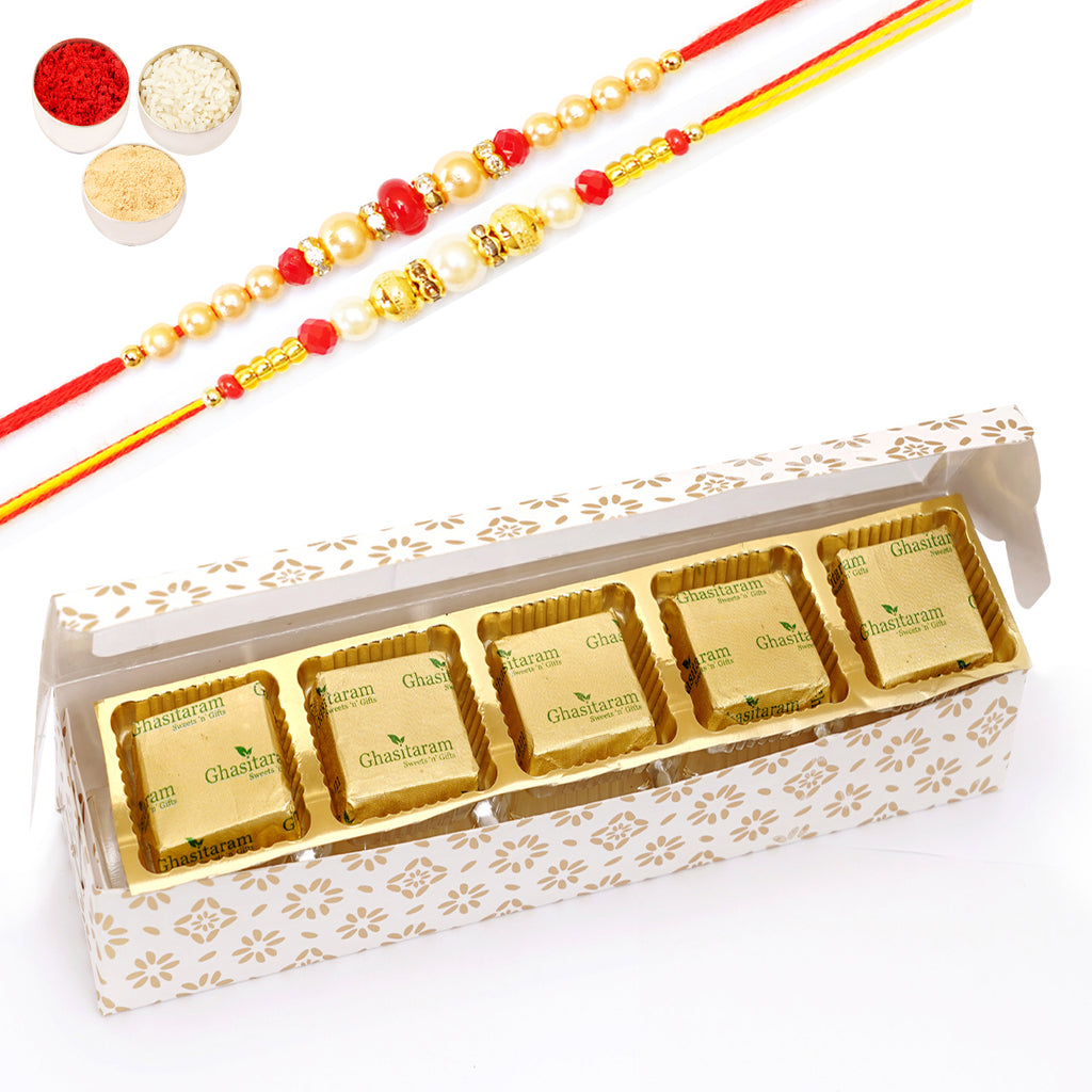 Rakhi Gifts-White printed 5 bites box with mewa bites with 2 Rakhis