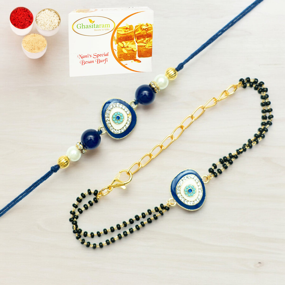 Rakhis Online Australia-Rmj- 5012 Bhaiya Bhabhi Rakhis with 200 gms of Besan Barfi