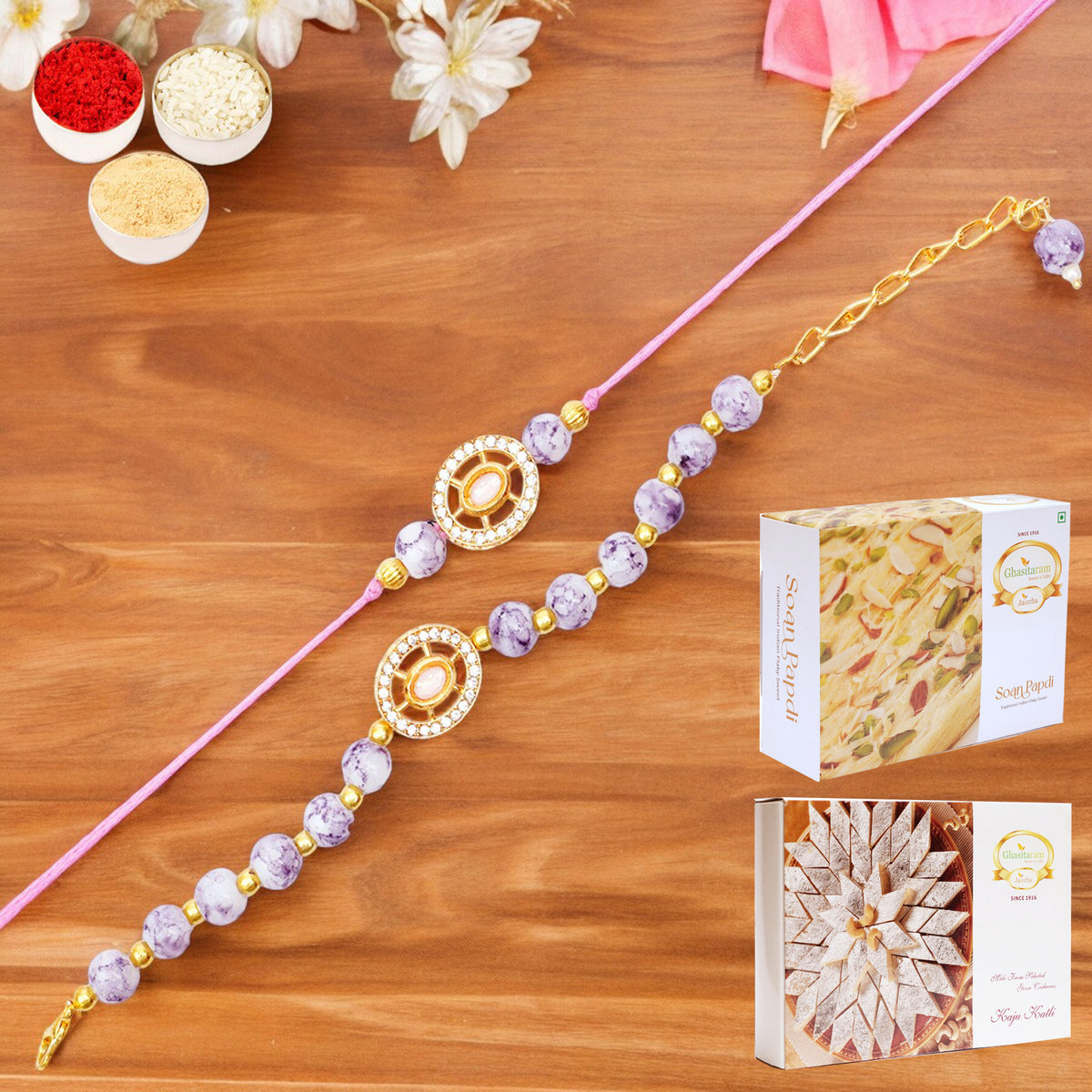 Rmj-6012 Bhaiya Bhabhi Rakhis with 200 gms of Kaju katli and 200 gms of Soan Papdi