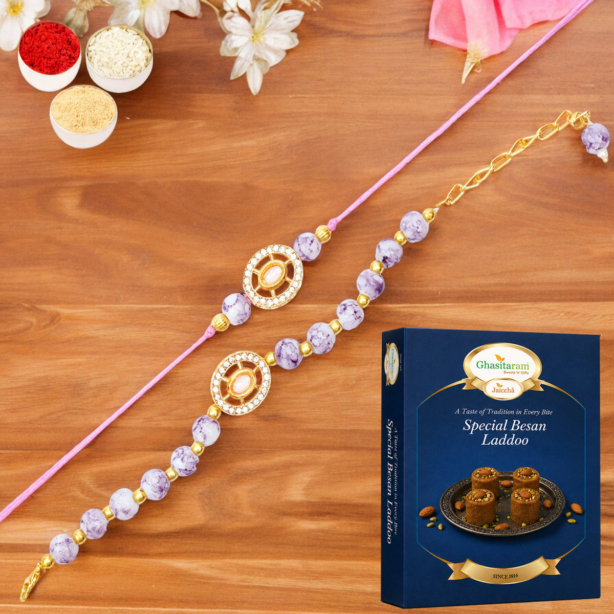 Rmj-6012 Bhaiya Bhabhi Rakhis with 200 gms of Besan Laddoo