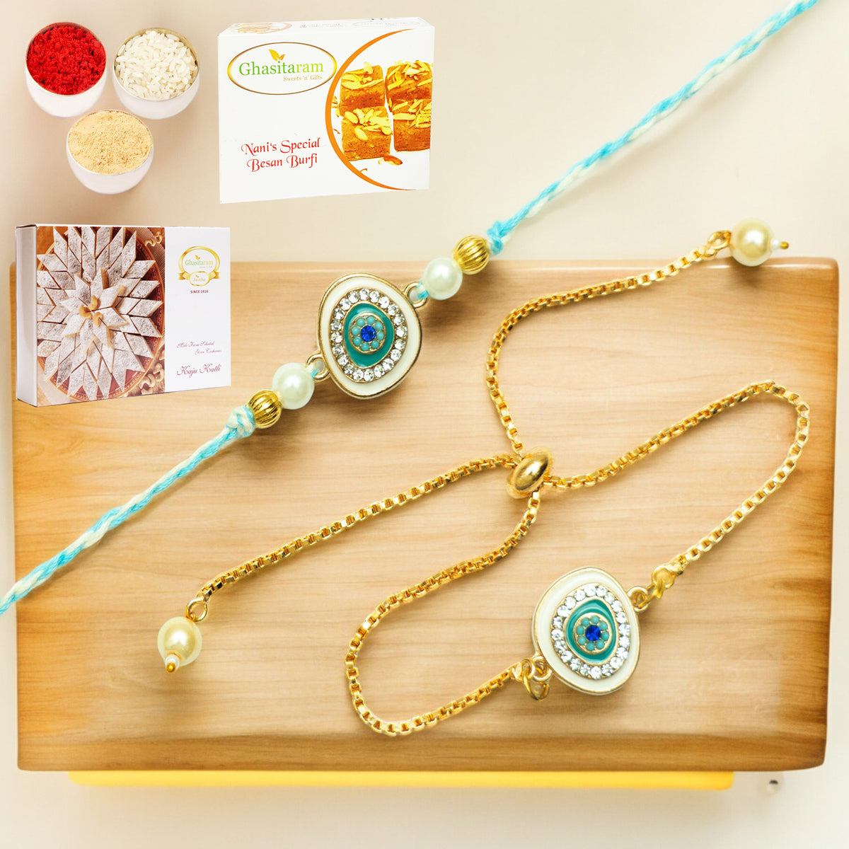 Rmj-6512 Bhaiya Bhabhi Rakhis with 200 gms of Besan Barfi and 200 gms of Kaju Katli