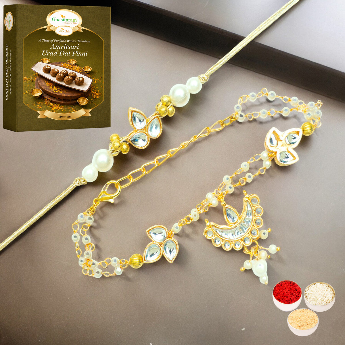 Rmj-8512 Bhaiya Bhabhi Rakhi with 200 gms of Pinni 