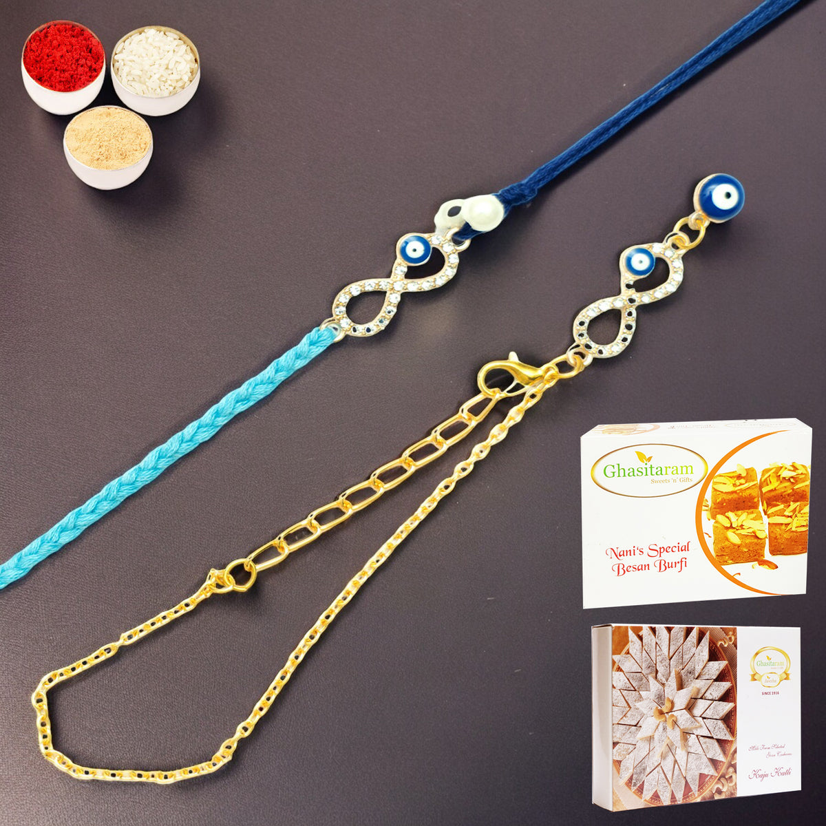Rmj-6012 Evil Eye Bhaiya Bhabhi Rakhis with 200 gms of Besan Barfi and 200 gms of Kaju Katli
