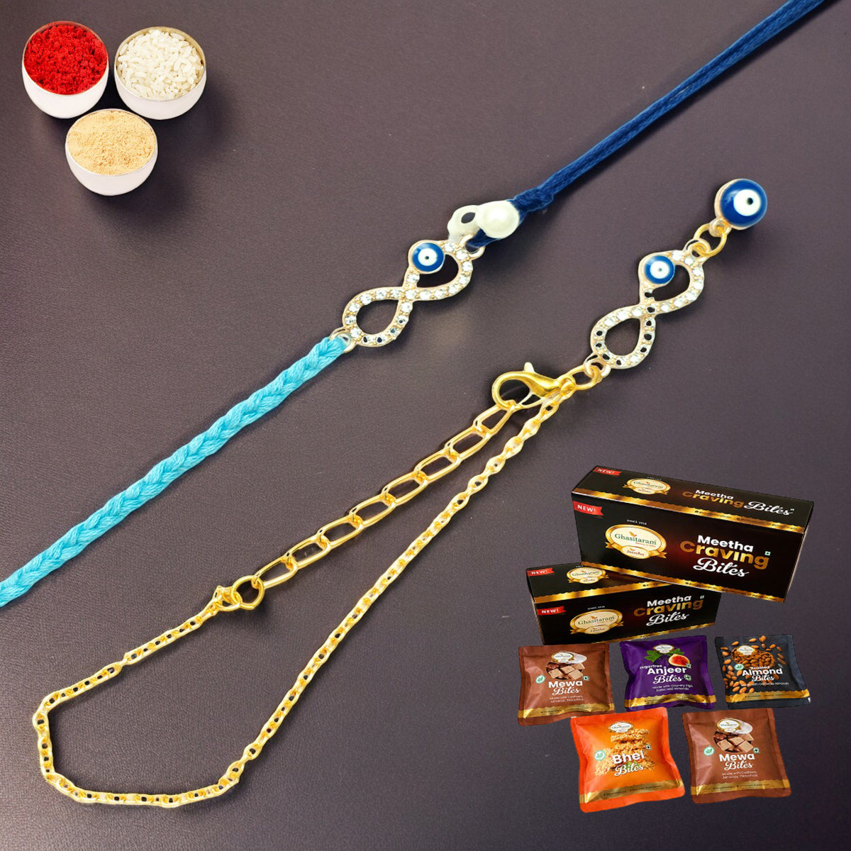 Rmj-6012 Evil Eye Bhaiya Bhabhi Rakhis with Asorted bites box