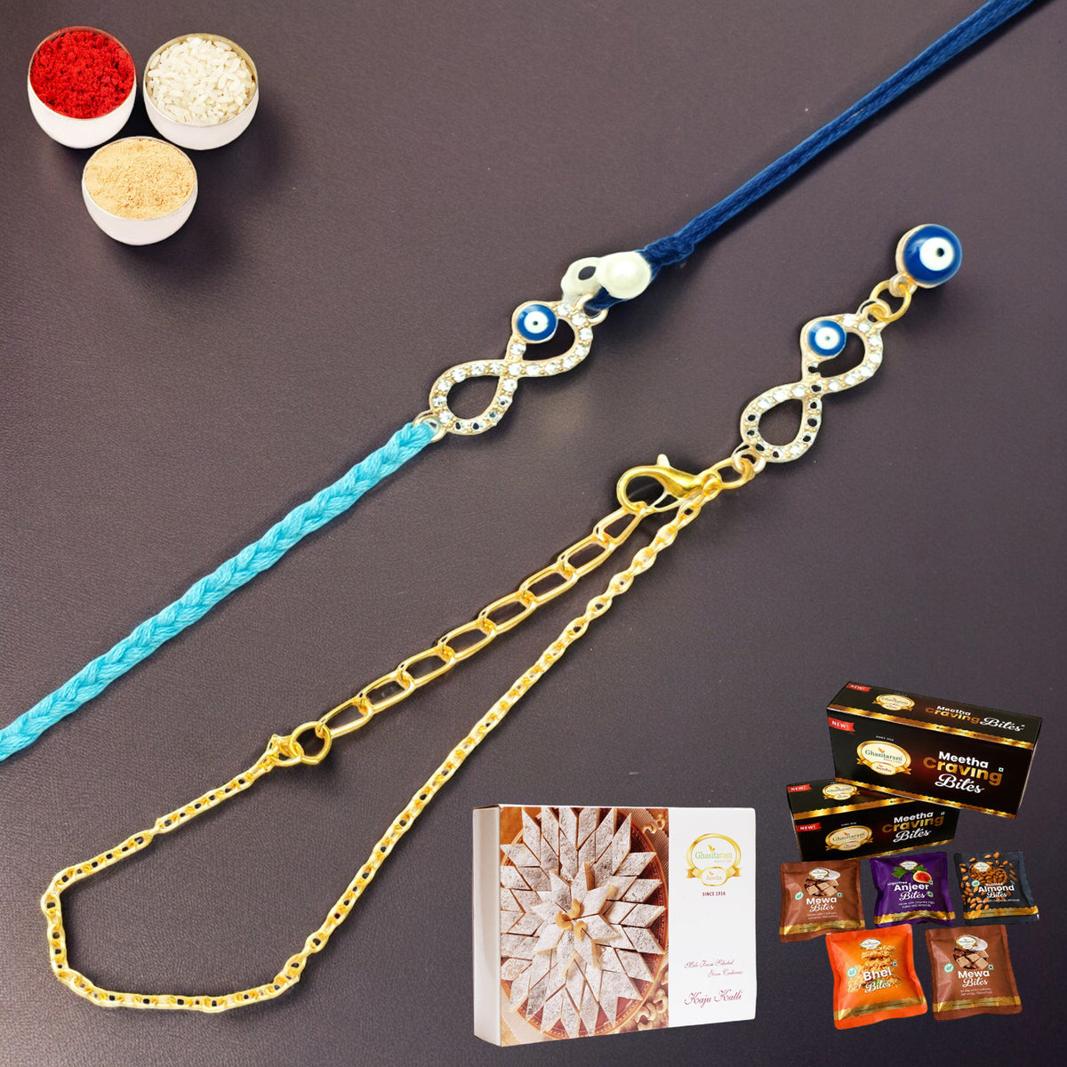 Rmj-6012 Evil Eye Bhaiya Bhabhi Rakhis with Asorted bites box and 200 gms of Kaju katli