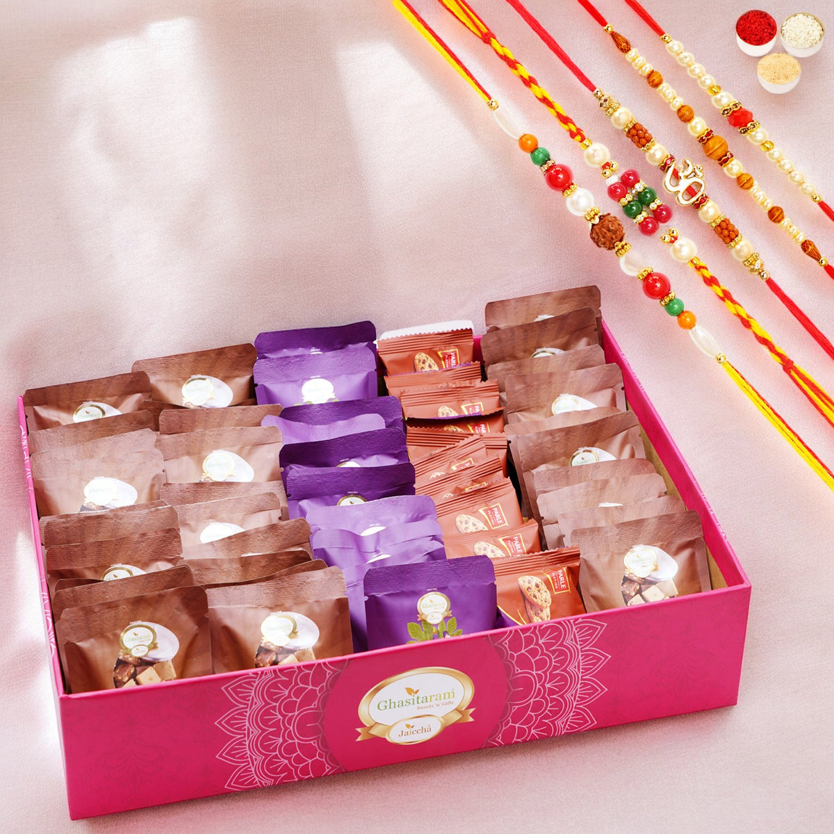 Ghasitaram Big Hamper Tray of 50 Mewa Bites, Sugarfree Anjeer Bites and Cookies with 5 Rakhis