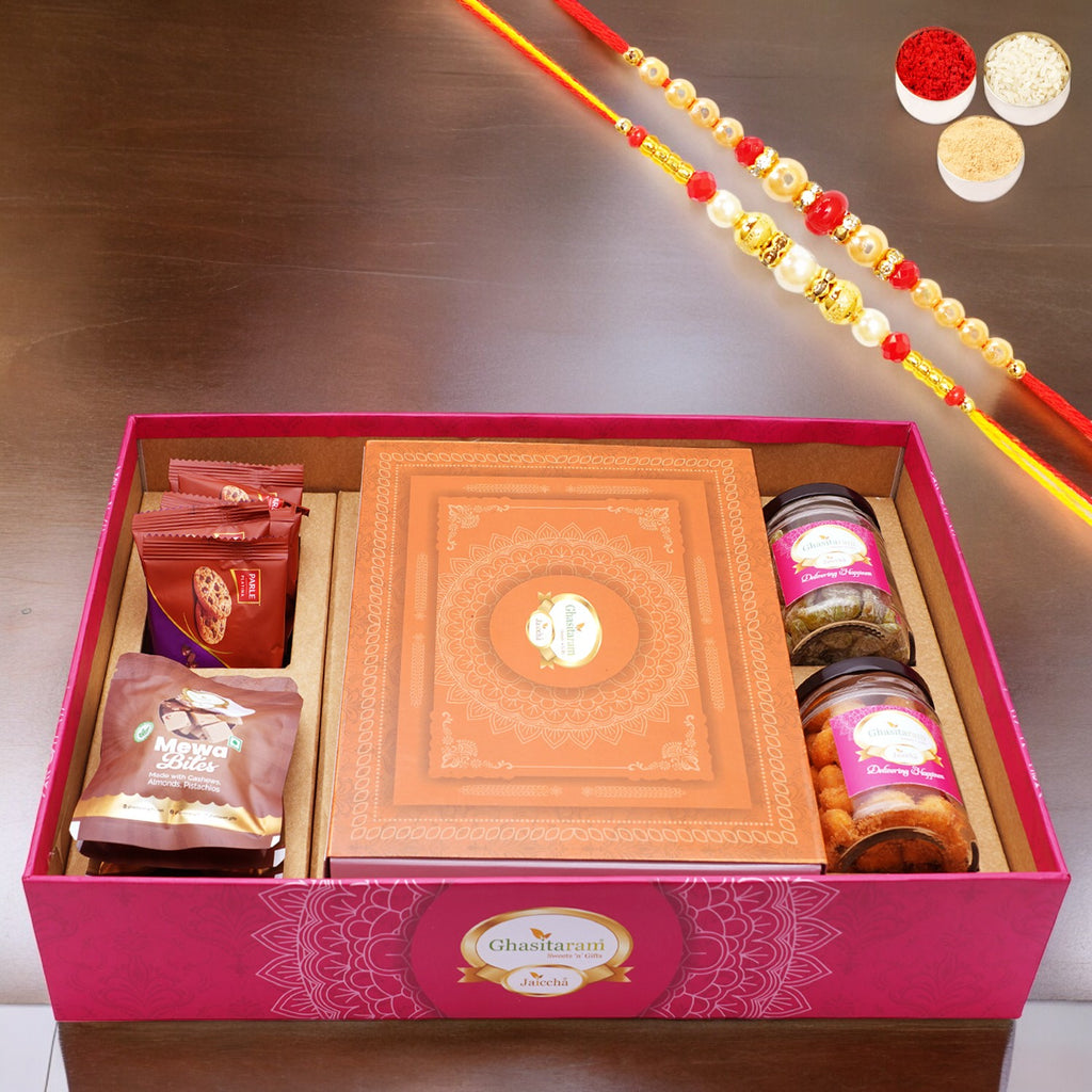 Ghasitaram Big Hamper Tray with Exotic Sweets, Crunchy Cashew, Paan Raisins, Mewa Bites and Cookies with 2 Rakhis