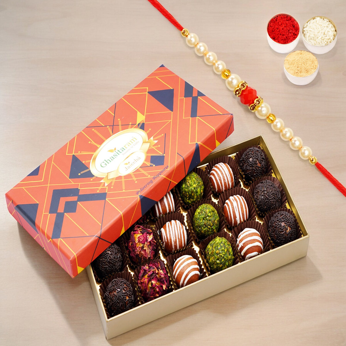 Assorted Fancy Dryfruit Laddoos 18 pcs in Designer Box with Pearl Beads Rakhi