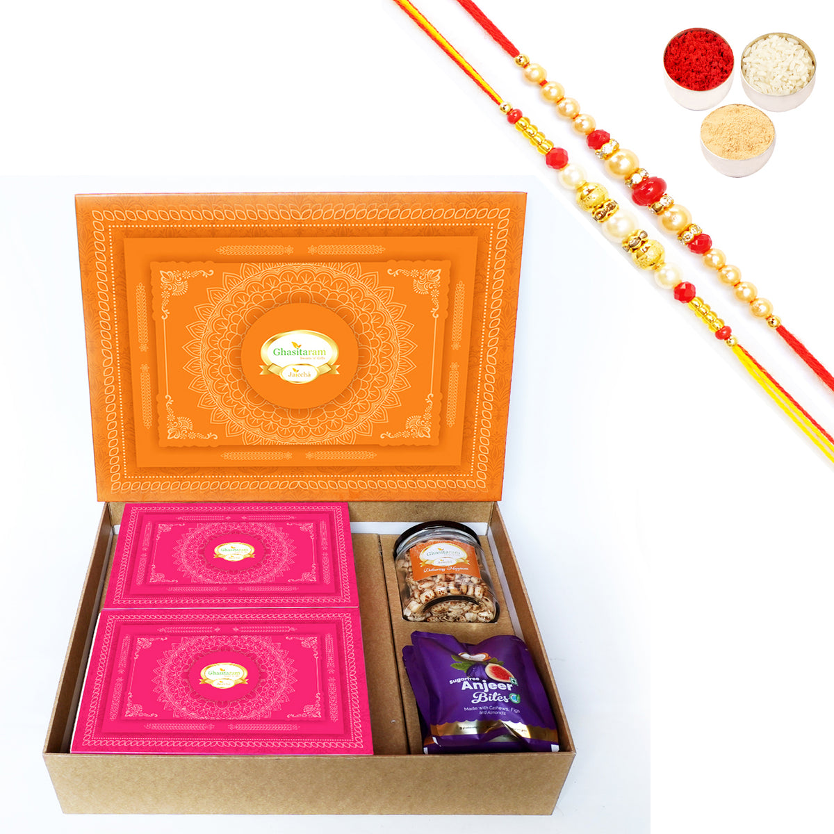 Rakhi Gifts-Orange Hamper Box with Sugarfree Kaju Katli, Sugarfree Peda, Sugarfree Bites and Wheat Puffs with 2 Rakhis