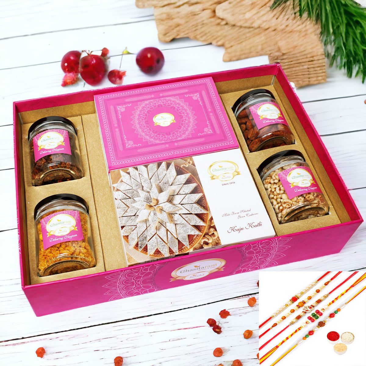Rakhi Gifts-Big Hamper Tray of Kaju Katlis, Milk Cake, Peri Almonds, Chiwda, Wheat Puffs and Paan with 5 rakhis