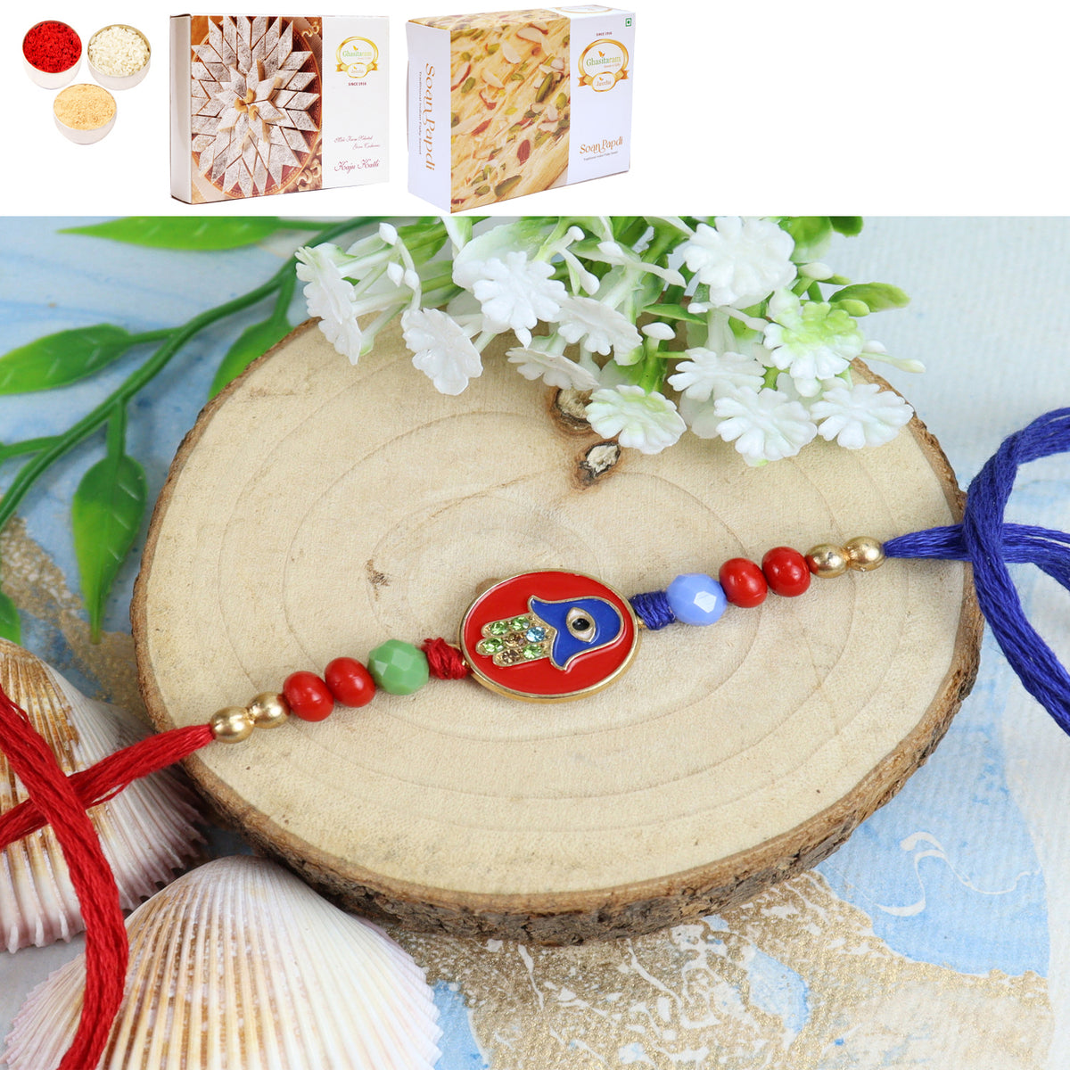 ST23-161 Evil Eye Premium Rakhi with 200 gms of Kaju katli and 200 gms of Soan Papdi