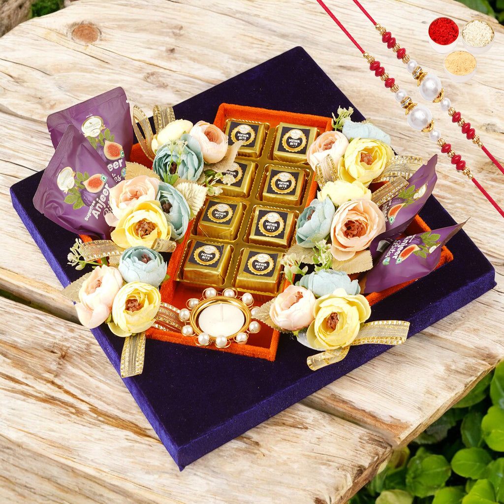 Rakhi Gifts-Blue velvet tray with Mewa bites with 2 rakhis