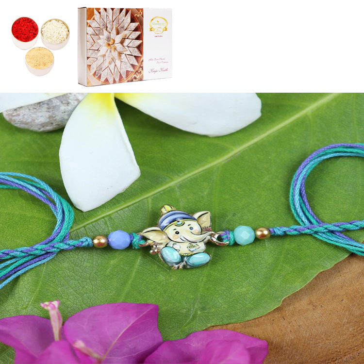 ST24-130- Printed Stone Ganpati Divine Rakhi with 400 gms of Kaju katli