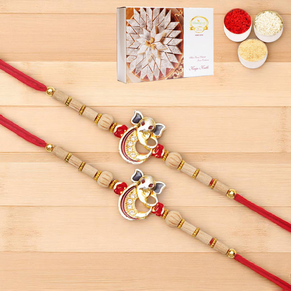 Rakhis Online UK-Set of 2 - A-2 Ganesha Divine Rakhi with 200 gms of Kaju katli