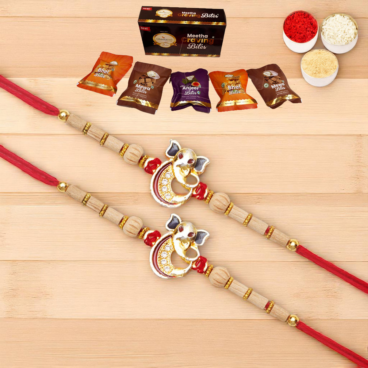 Rakhis Online Australia-Set of 2 - A-2 Ganesha Divine Rakhi with Asorted bites box