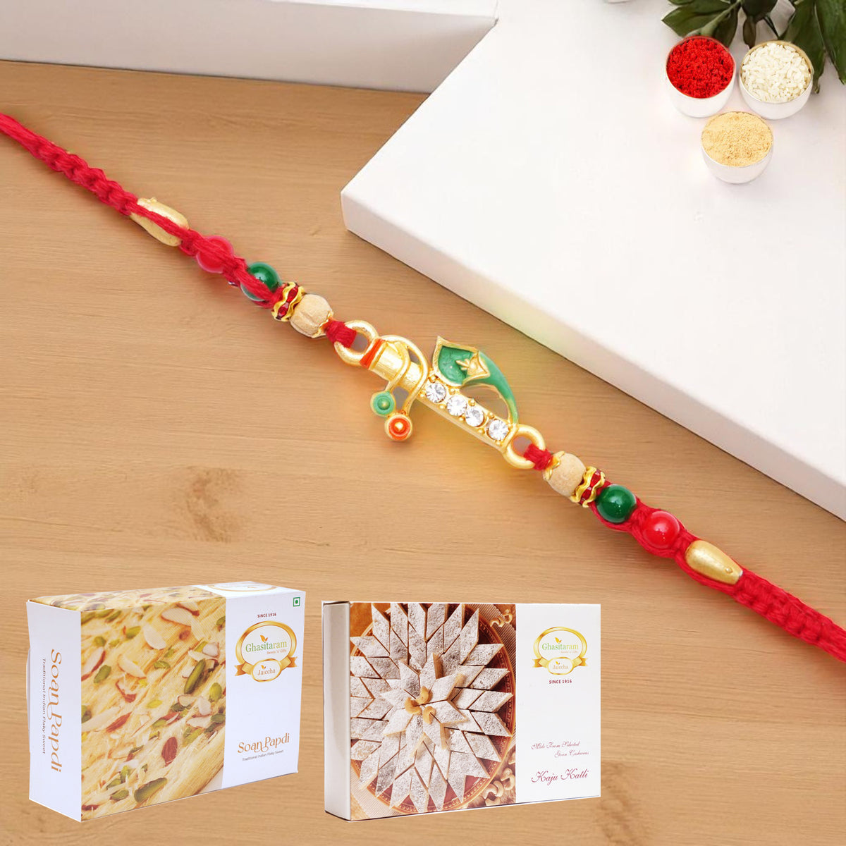 x-73 Divine Krishna Rakhi with 200 gms of Kaju katli and 200 gms of Soan Papdi