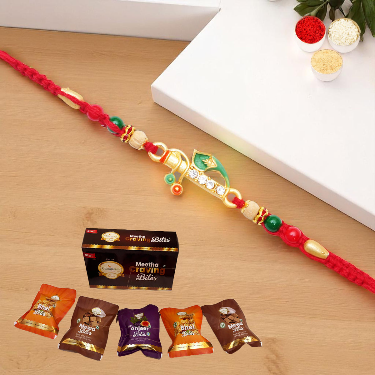 x-73 Divine Krishna Rakhi with Asorted bites box