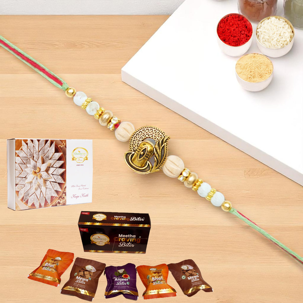 X-87 Om Shiv Divine Rakhi with Asorted bites box and 200 gms of Kaju katli
