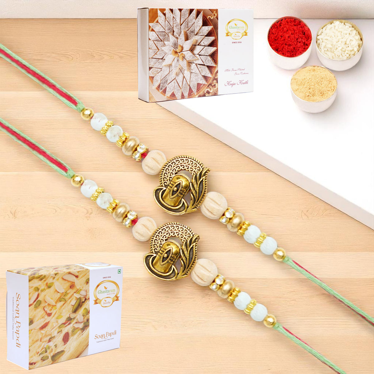 Set of 2 - X-87 Om Shiv Divine Rakhi with 200 gms of Kaju katli and 200 gms of Soan Papdi