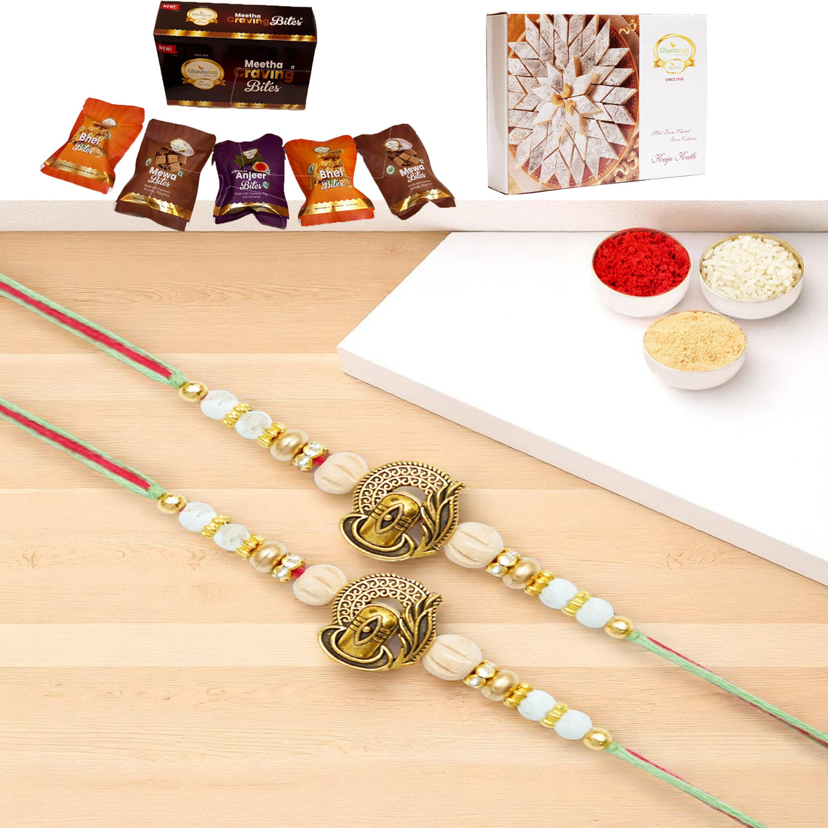 Set of 2 - X-87 Om Shiv Divine Rakhi with Asorted bites box and 200 gms of Kaju katli