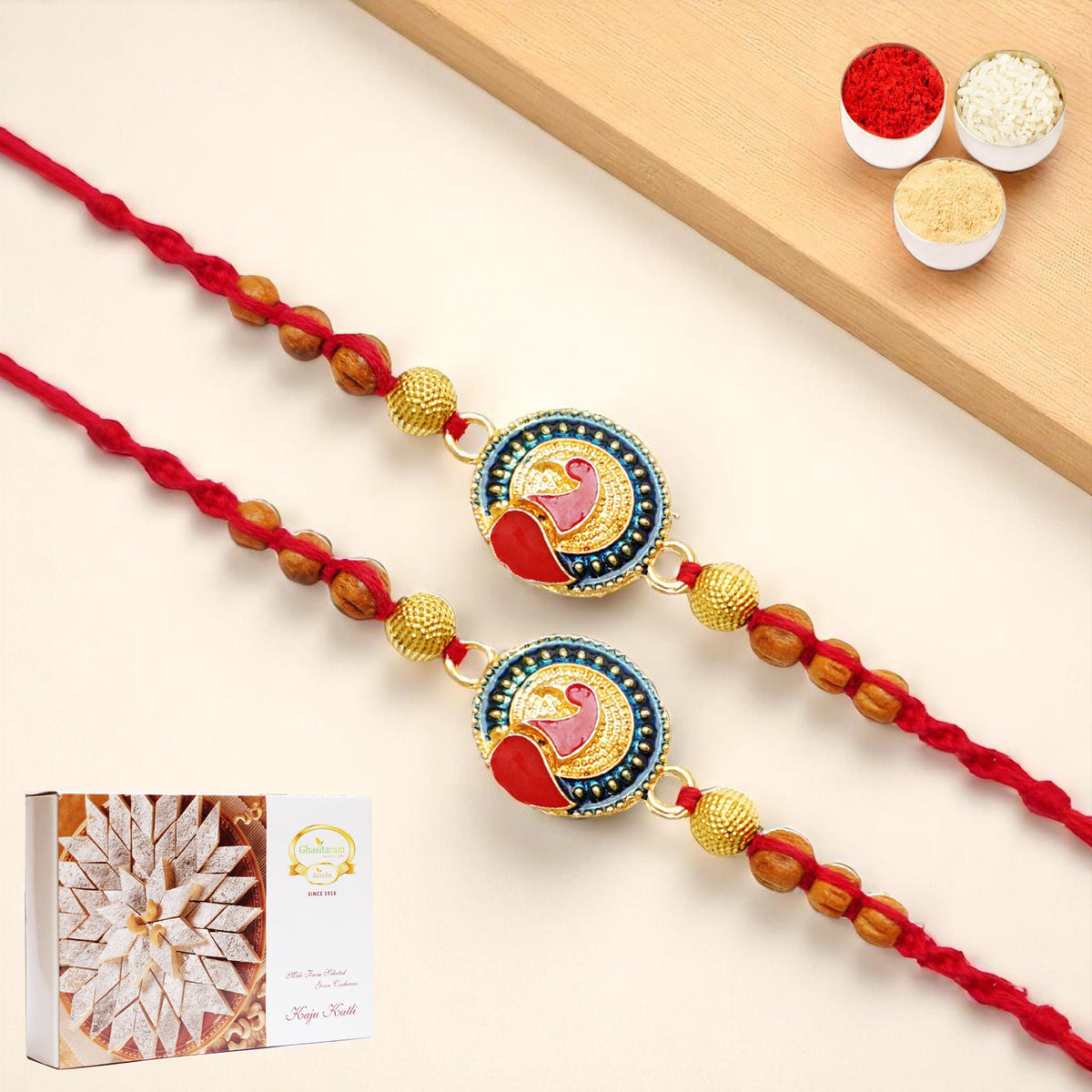 Rakhis Online UK-Set of 2 - Y-221 Peacock Divine Rakhi with 200 gms of Kaju katli
