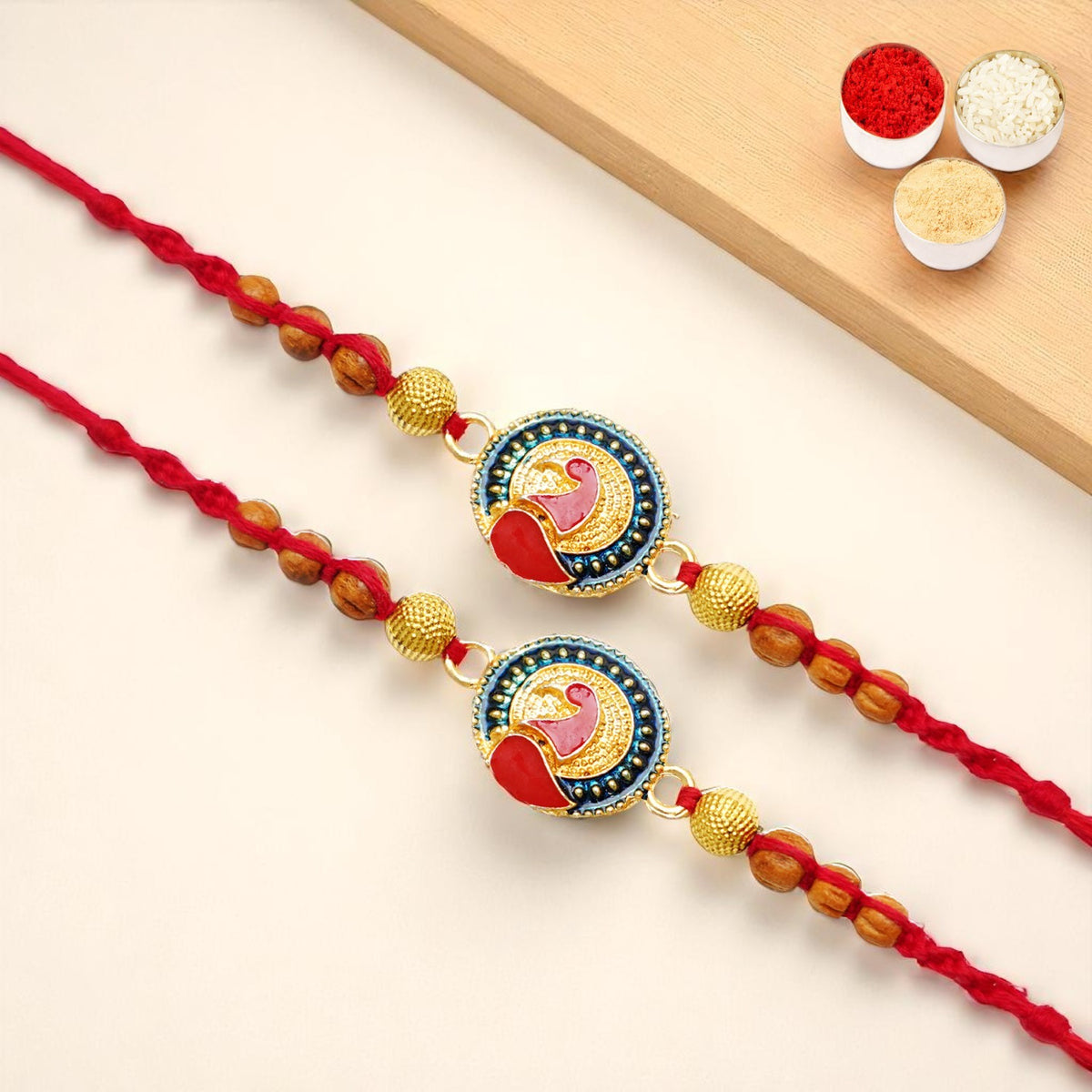 Rakhis Online USA-Set of 2 - Y-221 Peacock Divine Rakhi