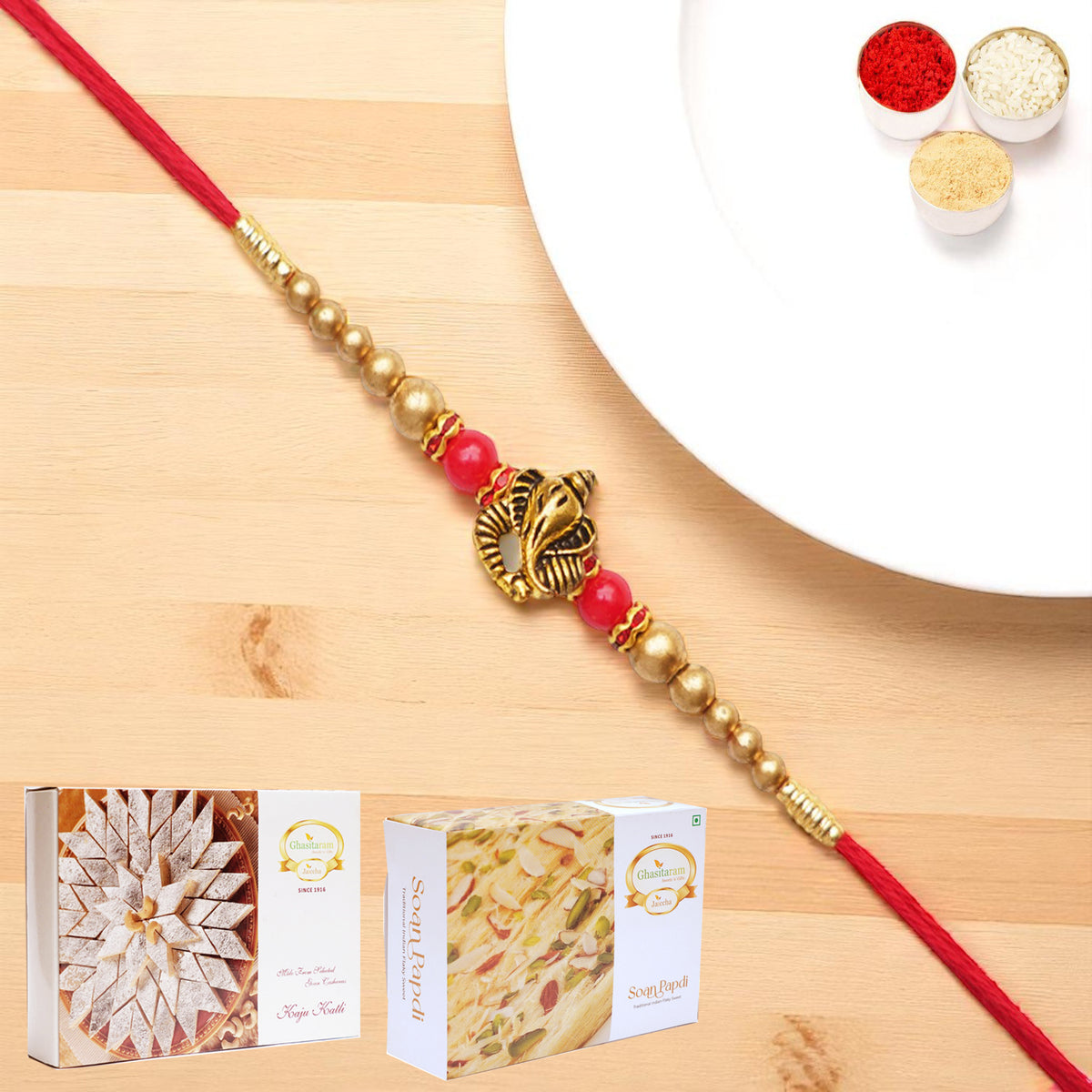 Y-26 Ganesha divine Rakhi with 200 gms of Kaju katli and 200 gms of Soan Papdi