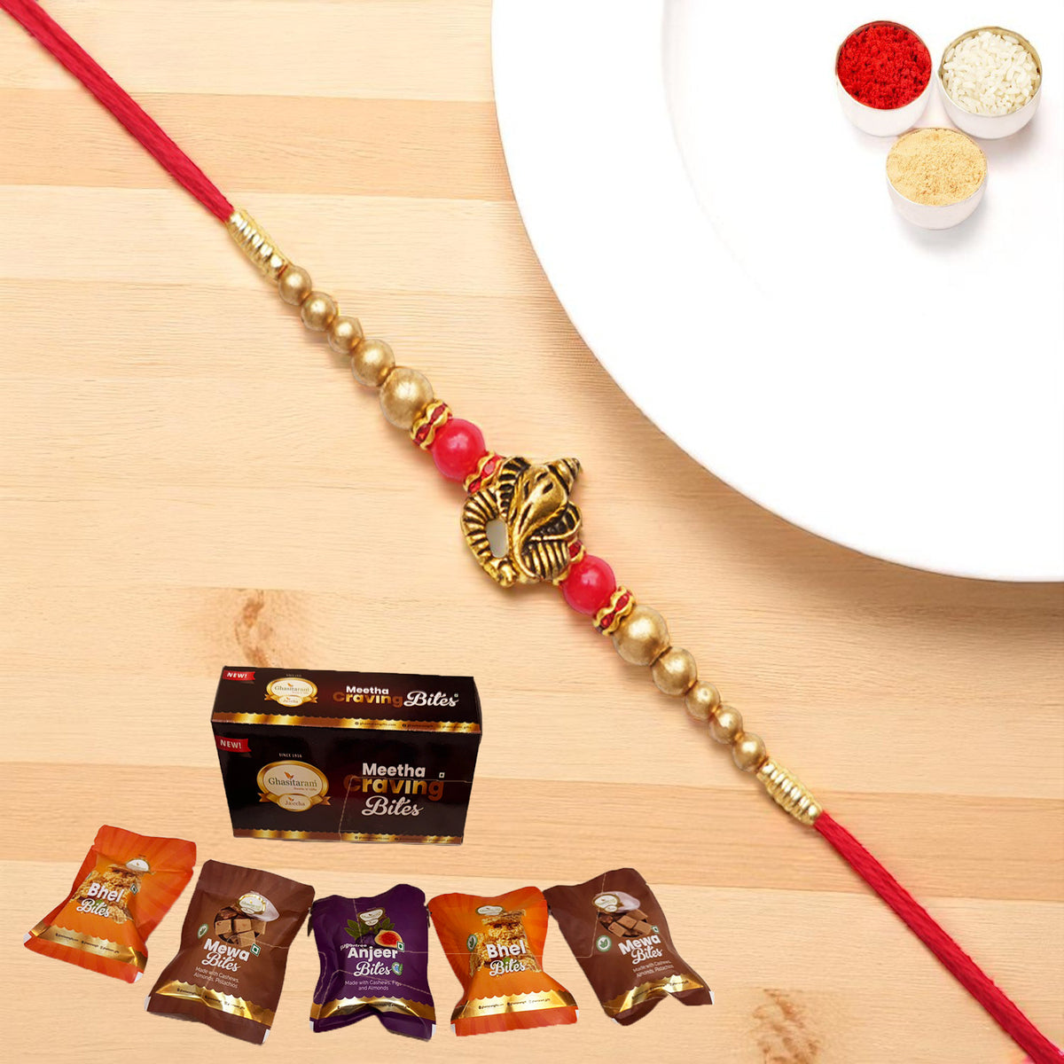 Y-26 Ganesha divine Rakhi with Asorted bites box